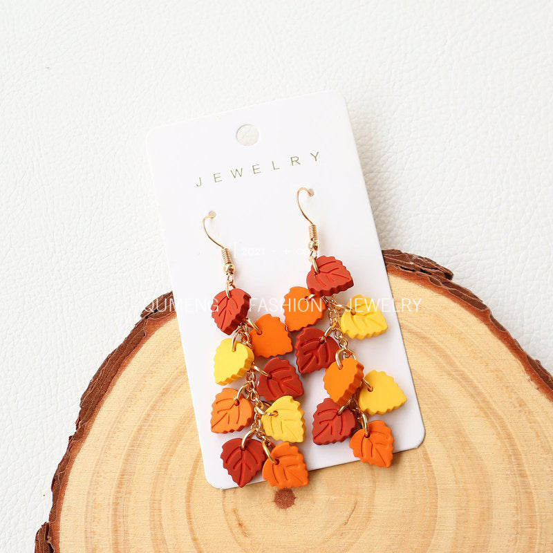 Wholesale Imitation Soft Pottery Hand Feel Spray Painted Acrylic Cat Maple Leaf Earrings